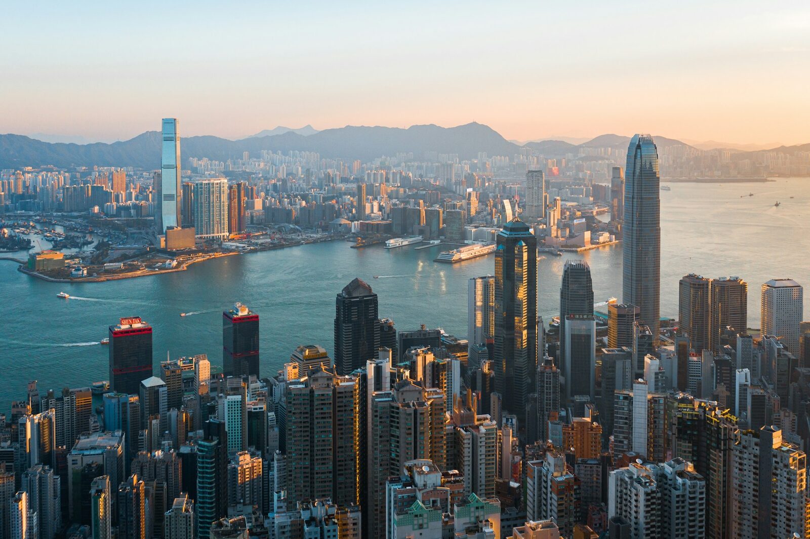 Victoria Harbour skyline at golden hour, Hong Kong